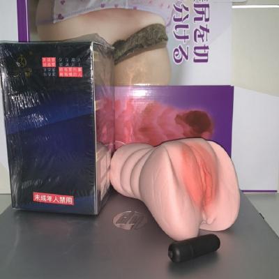 Âm đạo giả cầm tay Jiuai loại 2 lỗ có trứng rung tháo rời được